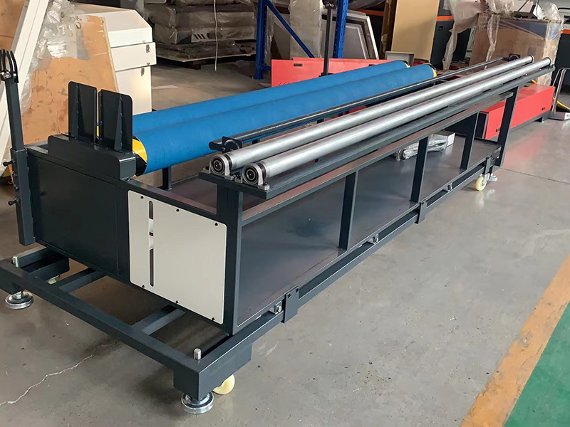 Laser fabric cutter automatic feeding system Laser fabric cutter automatic feeding system