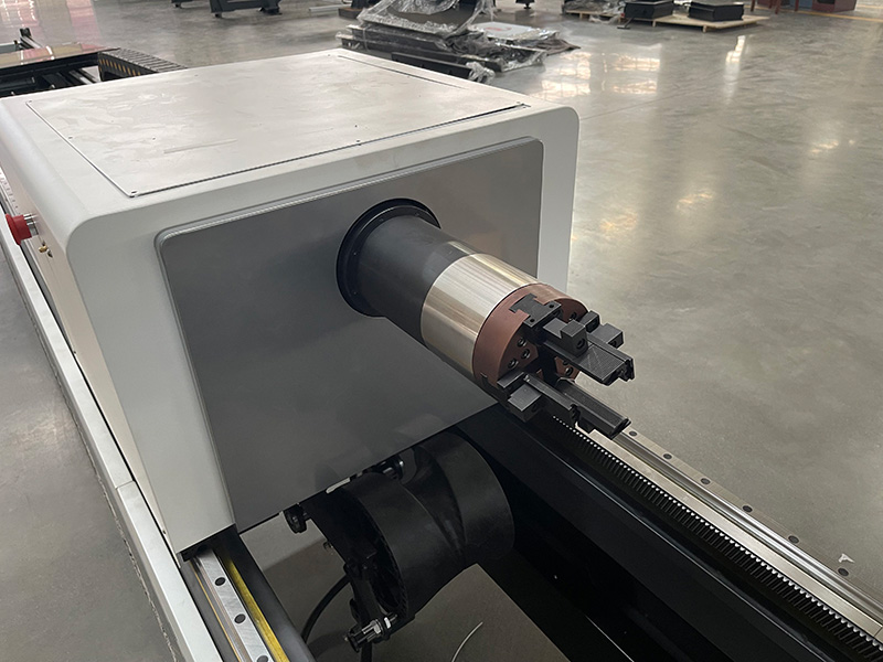 Rotary attachment for laser pipe cutting machine