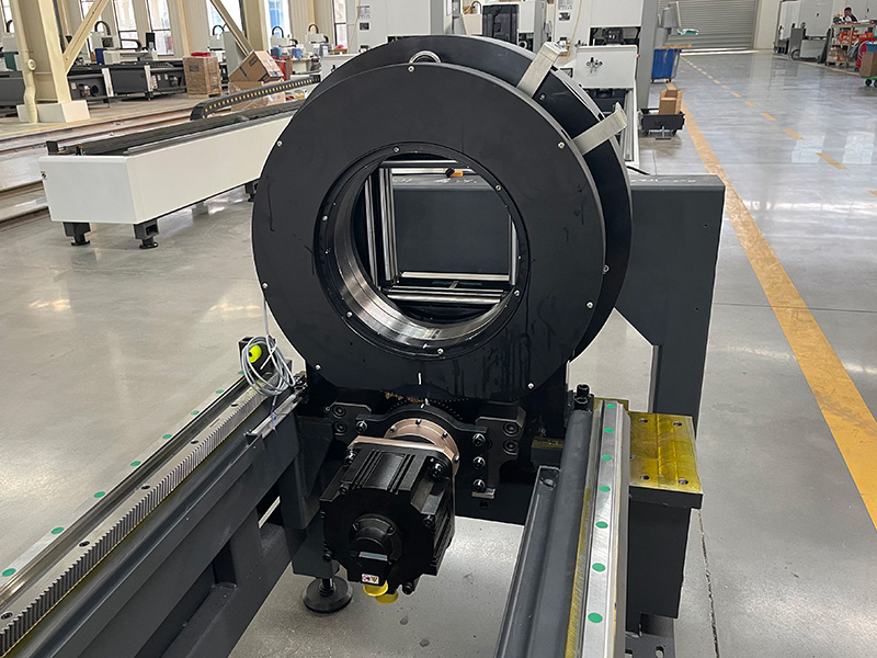 Rotary attachment for laser tube cutter